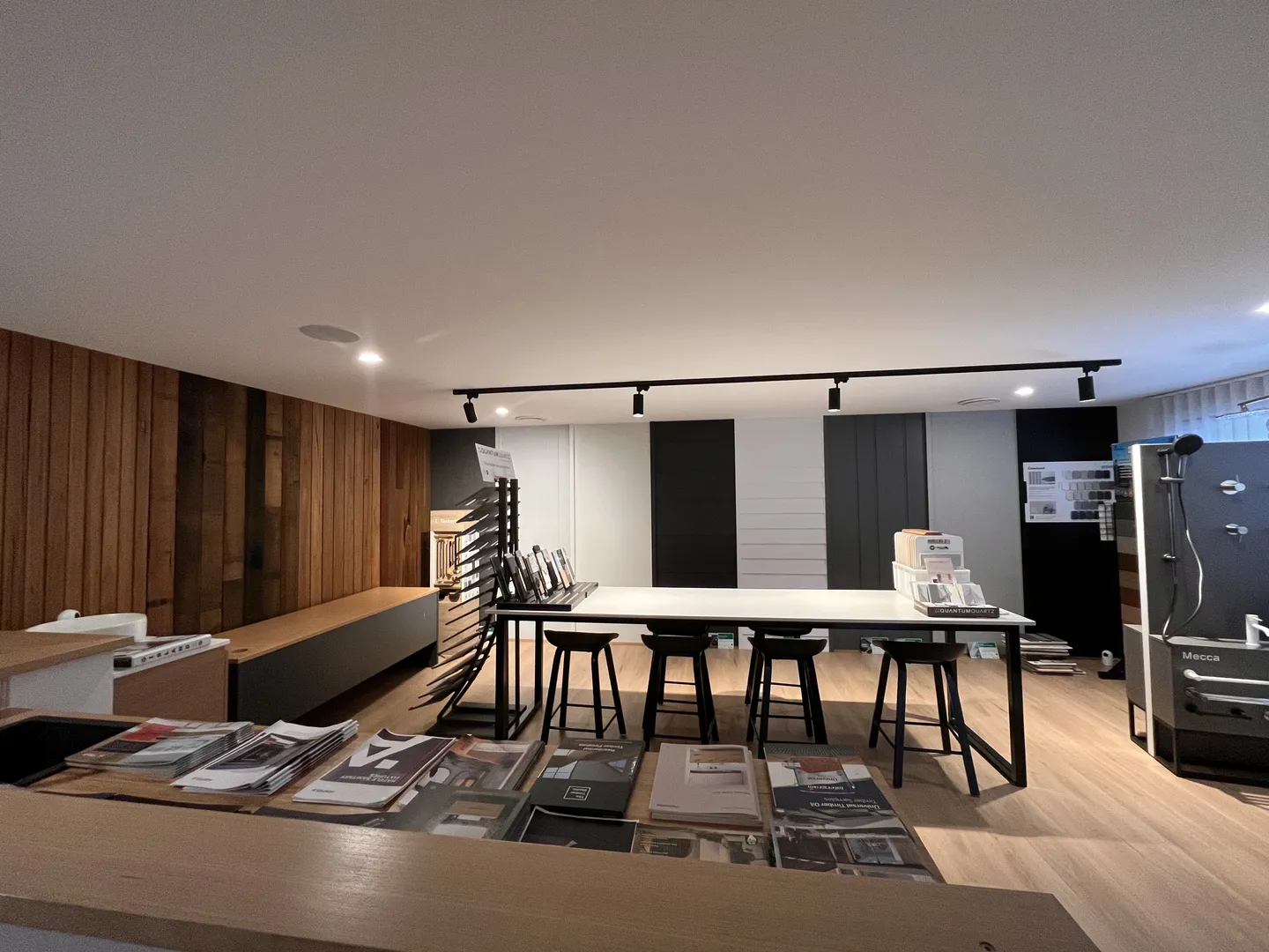 Modern showroom with furniture and design samples.